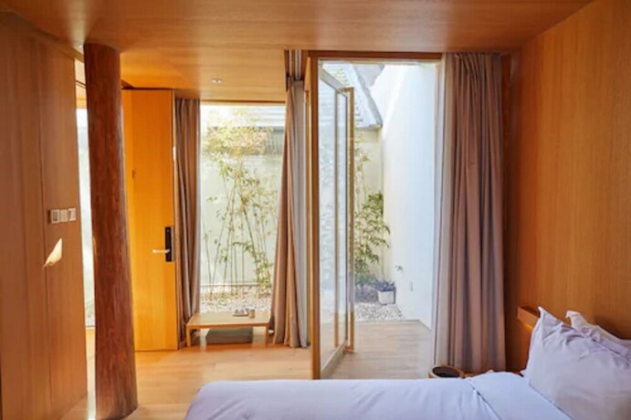 Imagen de la habitación del Hotel Layering Courtyard Hutel Qianmen. Foto 12