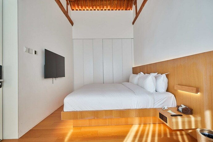 Imagen de la habitación del Hotel Layering Courtyard Hutel Qianmen. Foto 13
