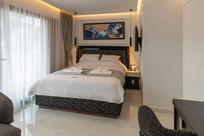 Imagen de la habitación del Hotel Lazar Lux Suites - Ammoudara. Foto 11