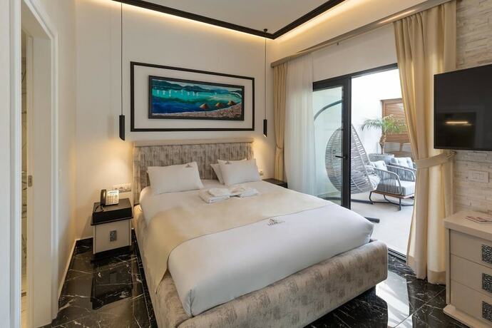 Imagen de la habitación del Hotel Lazar Lux Suites - Ammoudara. Foto 12
