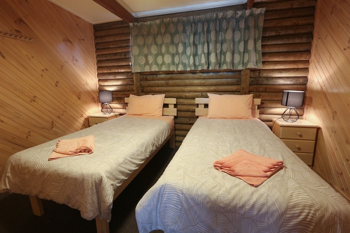 Imagen de la habitación del Hotel Lazy Acre Log Cabins. Foto 14