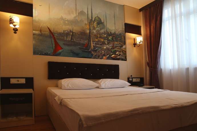 Imagen de la habitación del Hotel Lazz City. Foto 4