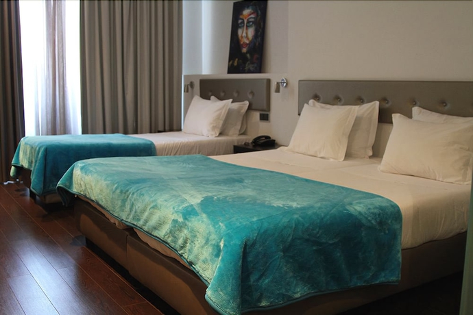 Imagen de la habitación del Hotel Lazza. Foto 10