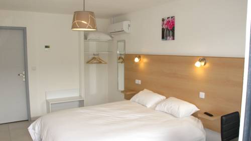 Imagen de la habitación del Hotel Le 15. Foto 6