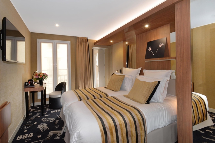 Imagen de la habitación del Hotel Le 18 Paris. Foto 8