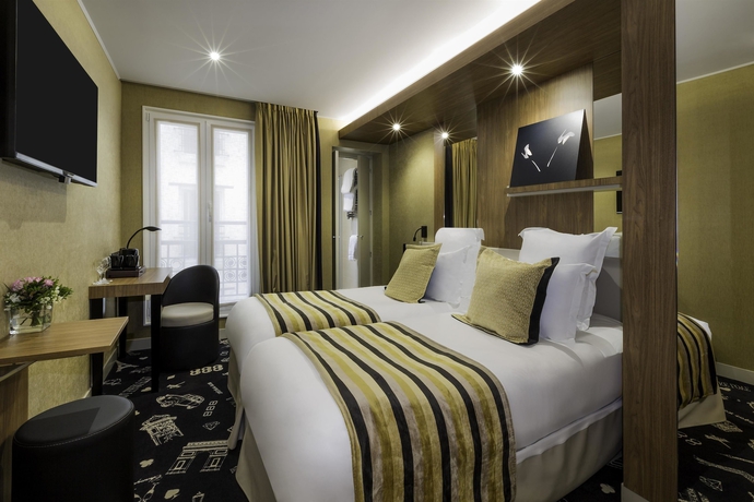 Imagen de la habitación del Hotel Le 18 Paris. Foto 9