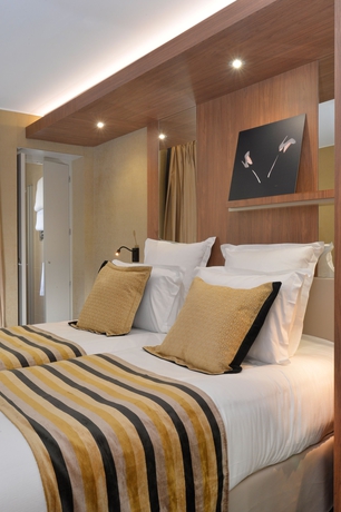 Imagen de la habitación del Hotel Le 18 Paris. Foto 12