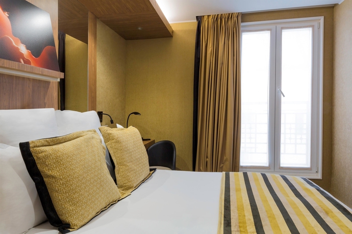 Imagen de la habitación del Hotel Le 18 Paris. Foto 14