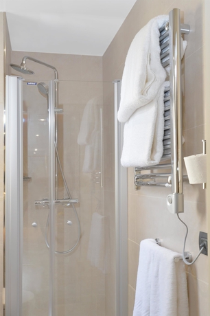 Imagen de la habitación del Hotel Le 18 Paris. Foto 16