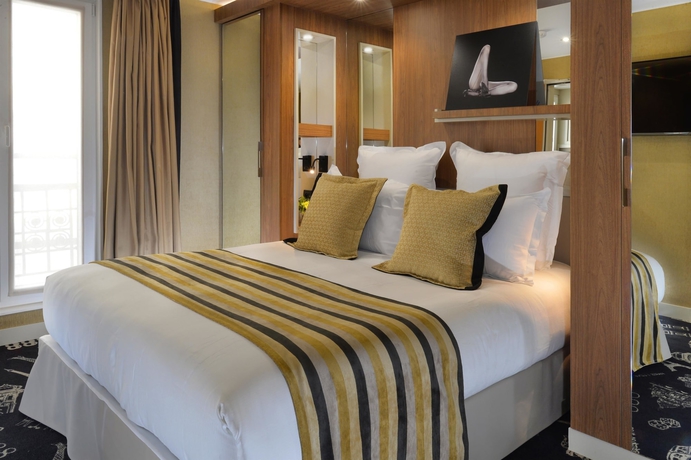 Imagen de la habitación del Hotel Le 18 Paris. Foto 17