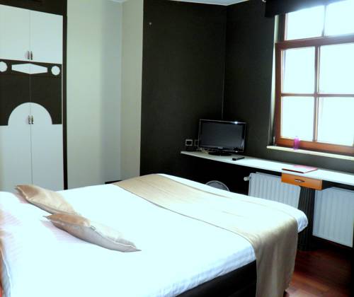 Imagen de la habitación del Hotel Le 1815. Foto 9