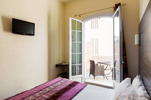 Imagen de la habitación del Hotel Le 21. Foto 5