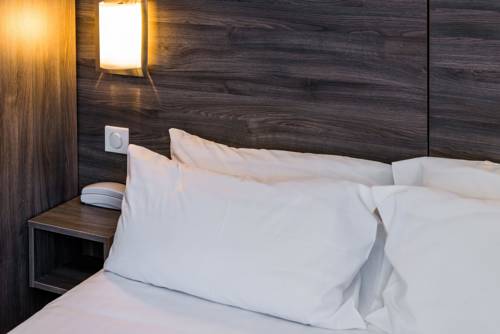 Imagen de la habitación del Hotel Le 21. Foto 6