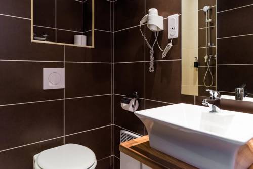 Imagen de la habitación del Hotel Le 21. Foto 13