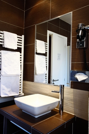 Imagen de la habitación del Hotel Le 46. Foto 10