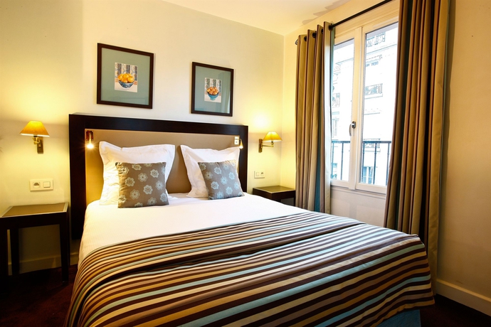 Imagen de la habitación del Hotel Le 46. Foto 11