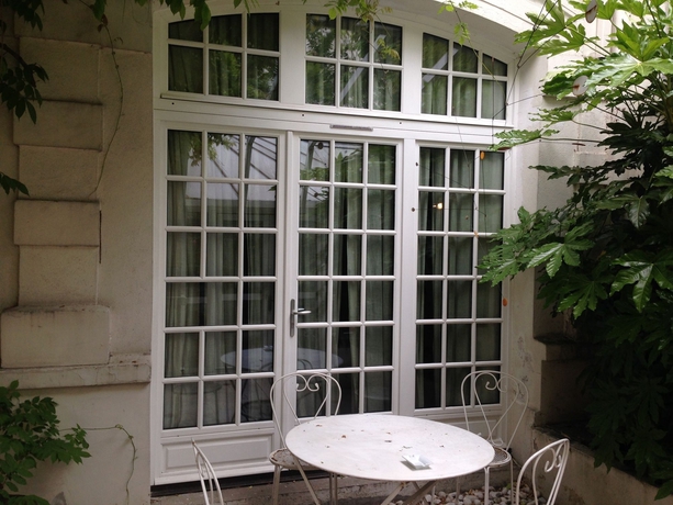 Imagen de la habitación del Hotel Le 5 Particulier. Foto 7