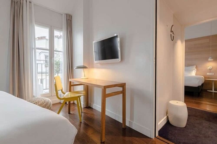 Imagen de la habitación del Hotel Le 9hotel Opera. Foto 12