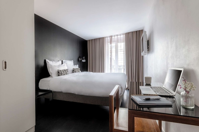 Imagen de la habitación del Hotel Le 9hotel Opera. Foto 14