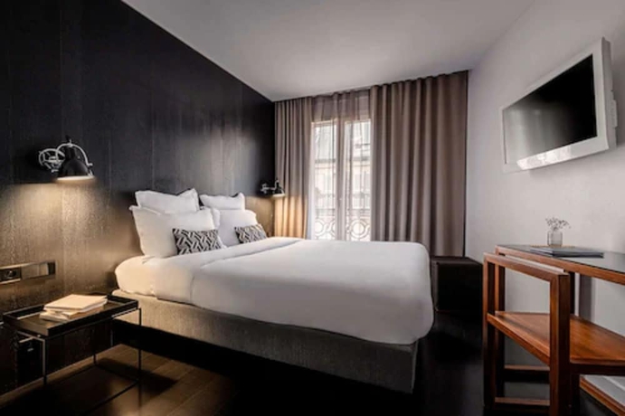 Imagen de la habitación del Hotel Le 9hotel Opera. Foto 15