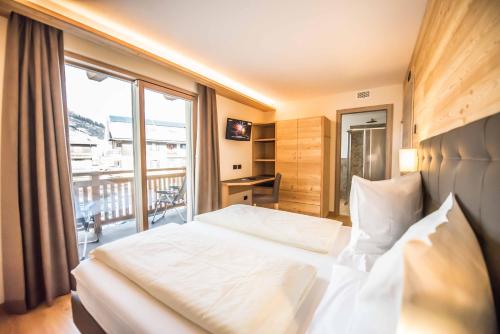 Imagen de la habitación del Hotel Le Alpi. Foto 6