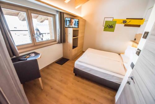 Imagen de la habitación del Hotel Le Alpi. Foto 7