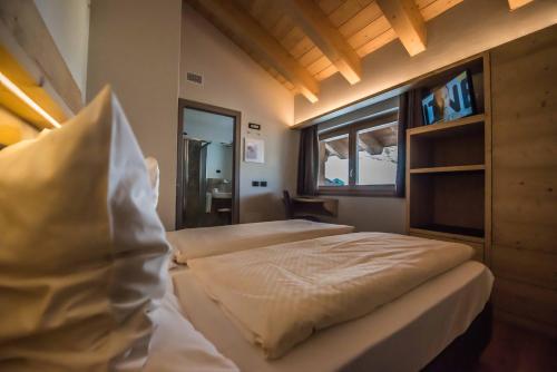 Imagen de la habitación del Hotel Le Alpi. Foto 9