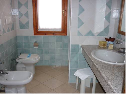 Imagen de la habitación del Hotel Le Anfore, Crabonaxa/Villasimius. Foto 3