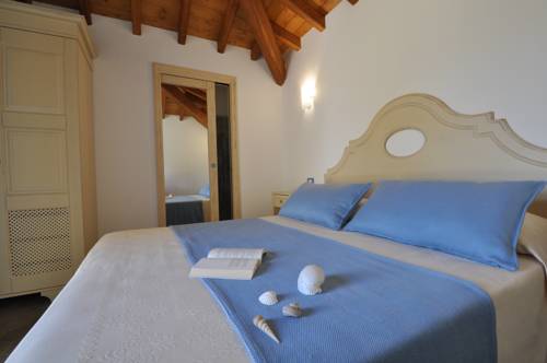 Imagen de la habitación del Hotel Le Anfore, Crabonaxa/Villasimius. Foto 11