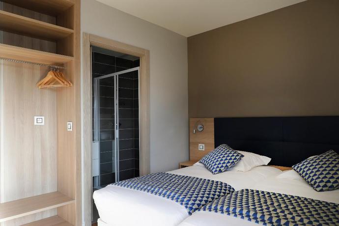 Imagen de la habitación del Hotel Le Bastia. Foto 12