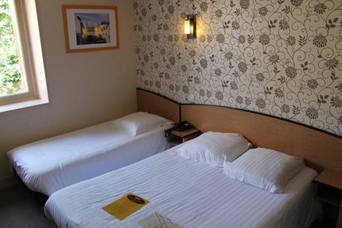 Imagen de la habitación del Hotel Le Bayeux. Foto 8