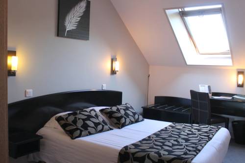 Imagen de la habitación del Hotel Le Bayeux. Foto 10