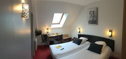 Imagen de la habitación del Hotel Le Bayeux. Foto 13