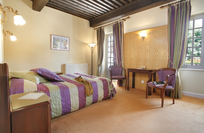 Imagen de la habitación del Hotel Le Beau Rivage. Foto 6