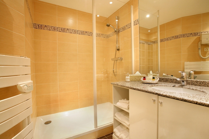 Imagen de la habitación del Hotel Le Beau Rivage. Foto 7