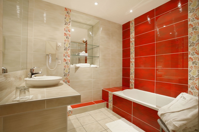 Imagen de la habitación del Hotel Le Beau Rivage. Foto 9