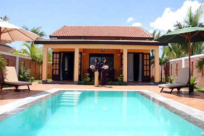 Imagen de la piscina del Hotel Le Belhamy Beach Resort and Spa, Hoi An. Foto 15