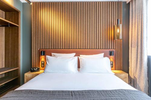 Imagen de la habitación del Hotel Le Bellune Paris. Foto 10