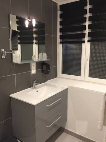 Imagen de la habitación del Hotel Le Beverl'inn. Foto 3