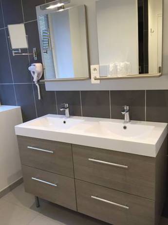 Imagen de la habitación del Hotel Le Beverl'inn. Foto 5