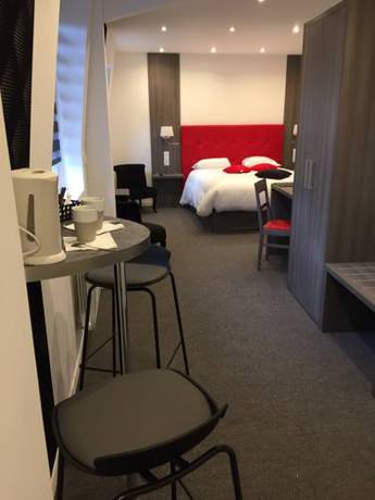 Imagen de la habitación del Hotel Le Beverl'inn. Foto 6