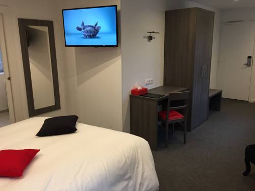 Imagen de la habitación del Hotel Le Beverl'inn. Foto 7