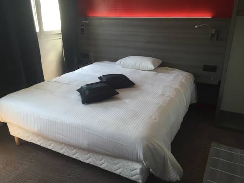 Imagen de la habitación del Hotel Le Beverl'inn. Foto 10
