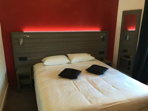 Imagen de la habitación del Hotel Le Beverl'inn. Foto 12