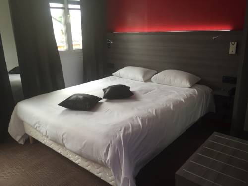 Imagen de la habitación del Hotel Le Beverl'inn. Foto 13