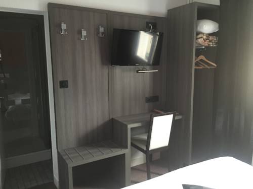 Imagen de la habitación del Hotel Le Beverl'inn. Foto 14