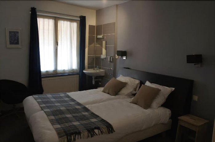 Imagen de la habitación del Hotel Le Bistro. Foto 10