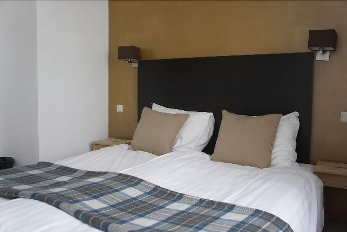 Imagen de la habitación del Hotel Le Bistro. Foto 11