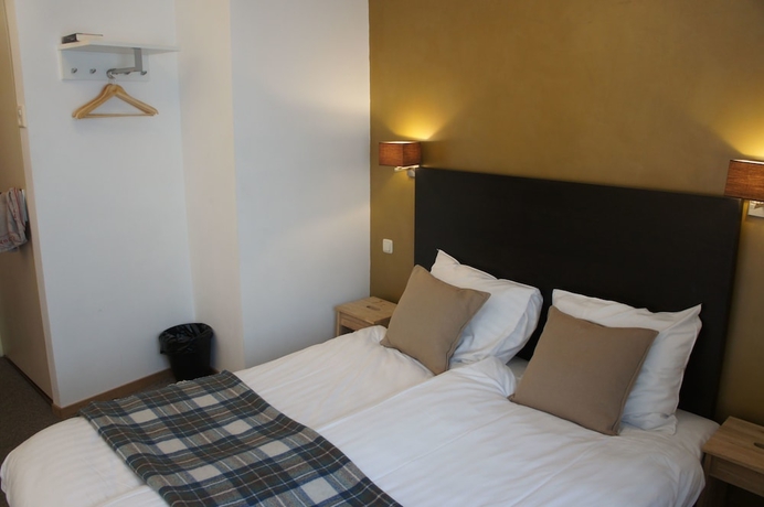 Imagen de la habitación del Hotel Le Bistro. Foto 12