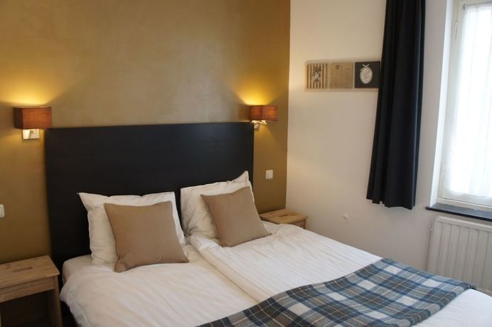 Imagen de la habitación del Hotel Le Bistro. Foto 13
